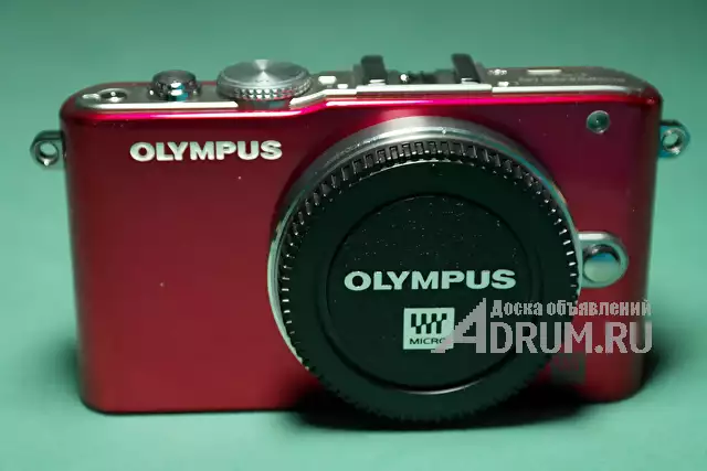 Фотоаппарат беззеркальный Olympus E - PL3 новый, красного цвета, тушка, матрица Micro 43, в Москвe, категория "Компактные фотоаппараты"