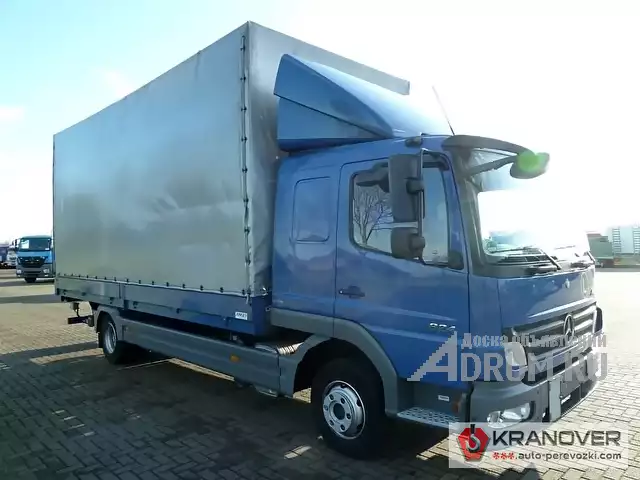 Аренда тентованного грузового авто 10 т с гидролифтом в Москвe